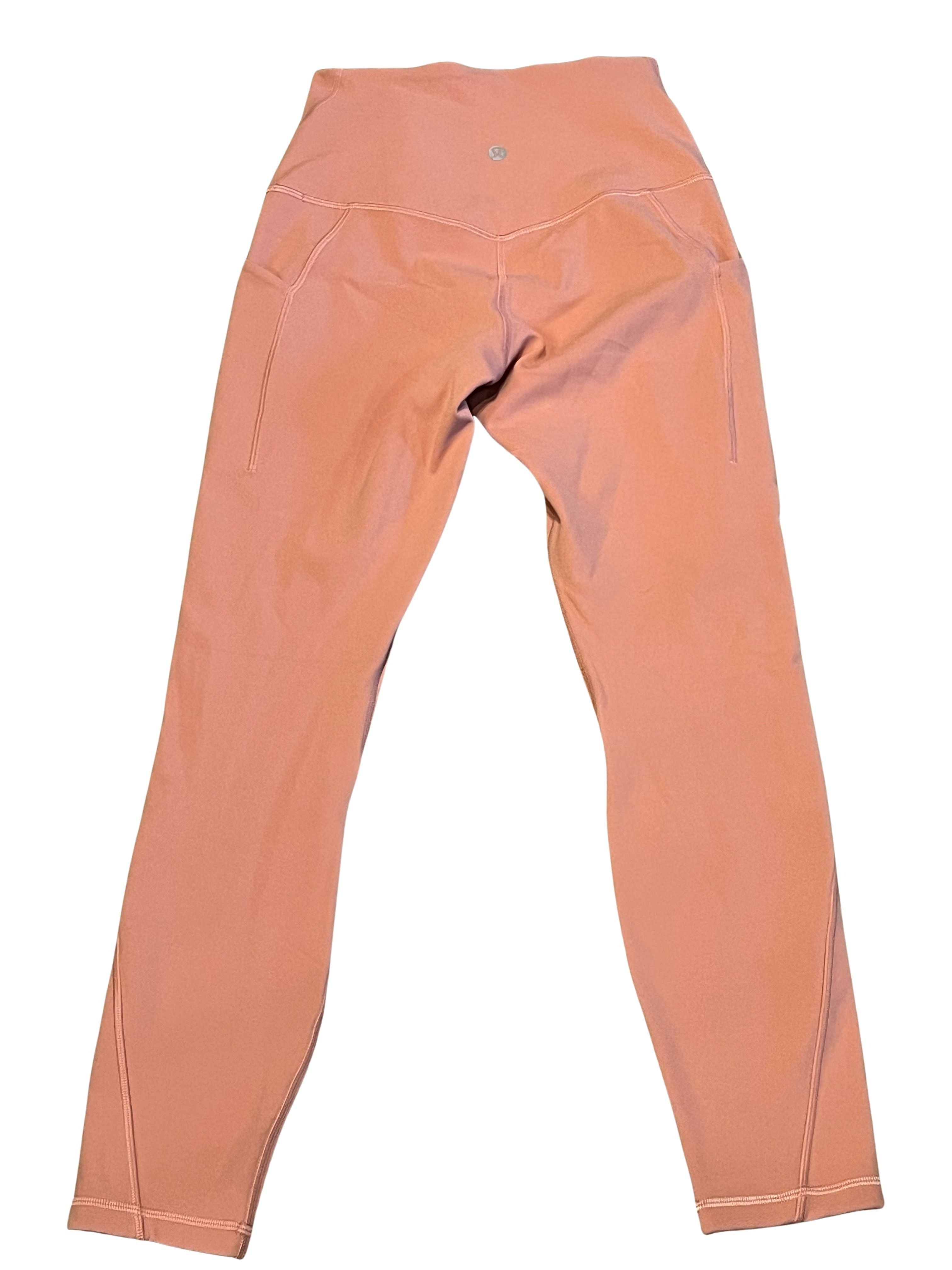 Lululemon Women's High-Rise Pink Leggings with Side Pockets
